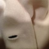 Button hole opening is too small.