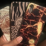 Plastic, thin and printed. Nothing like the pictures advertised on their website.