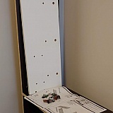 This is the replacement piece (white) in front of the left-side version of the piece that was missing (I was missing right side).