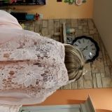 This is my large shirt. The opening is so small I can't get it over my head... and I have a small head