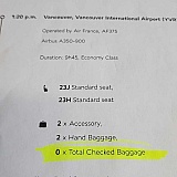 Air France receipt shows 0 checked baggage included