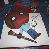 Bespoke cake of the spoof Dead Pool Character Bob Ross in Avengers. Unique, beautifully crafted & looks exact replica of the photo I sent of the figure my son ordered from Amazon.