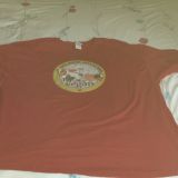 Massive shirt, 4 sizes too big plus the print is cracked, faded, has holes & u can see the red shirt thru it.