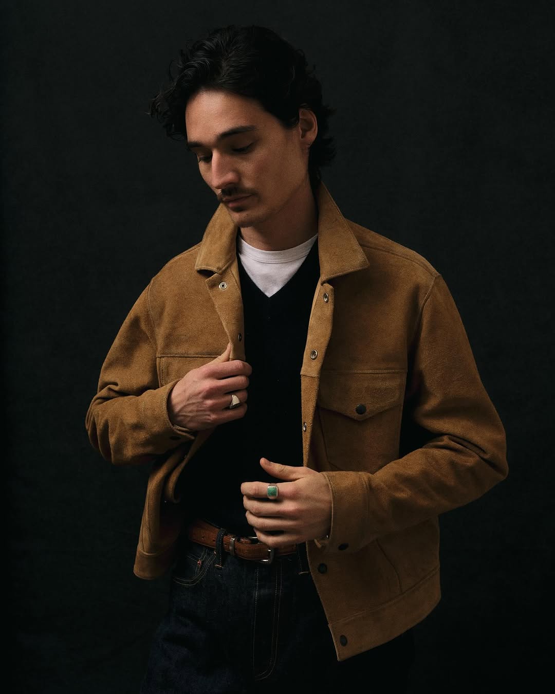 Merchandise from Buck Mason clothing line