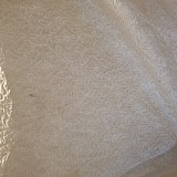 Shein cover held against light