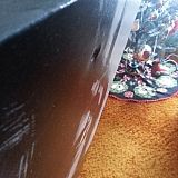 A torn hole right in the canvas.