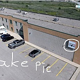 This is a fake photo from the cooking website. They photoshopped the logo onto the square.