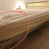 The bottom ends barely reach the bottom of the bed but I can't pull it right down over the mattress to secure it in place. When I sit or lay on the bed, the ends come off completely. Absolutely useless.