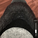 Exposed sewing threads in the back of the heel