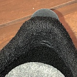 Exposed sewing threads in back of heel area