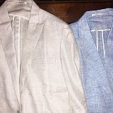 Two suits I received showing skinny ugly lapels that I have never even seen before in my life. The beige one looks horrible.