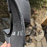 Stitching imperfection on edge of bill. These hats are supposed to be quality inspected before being shipped...