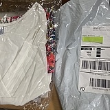 Two pretty women's shirts from Noracora (or as it was billed on my Visa bill: "JoyForNiceDesigns") but they didn't fit. Note the return address is 216 Harris St So. San Francisco, California.