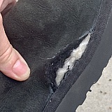 Manufacturing defect, not caused by accident or misuse. Only lightly worn.