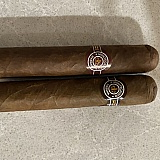 Longer cigar is the Montecristo Edmundo (Fake) smaller cigar is out of my humidor Montecristo Petit Edmundo (Real). Notice the difference in labels.