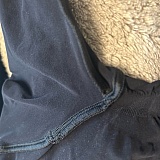 Armpits had deodorant stains.