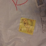 There are six reasons provided on the yellow Chinese postage sticker. The little ink mark is on the REFUSED indicator, Other reasons are UNKNOWN, GONE AWAY, INSUFFICIENT ADDRESS, REMOVED and UNCLAIMED;'