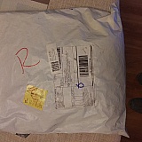 Please view other photo for close-up of yellow Chinese return sticker;