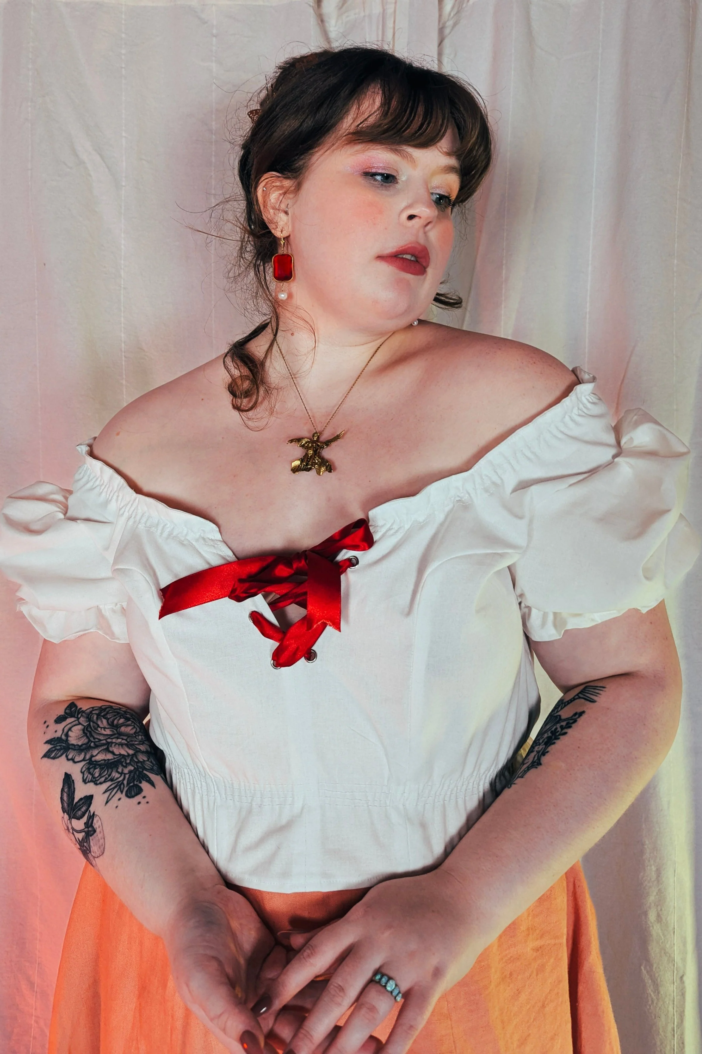 Merchandise from Haus Dahlia clothing line