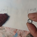 A piece of natural blue corundum for comparison