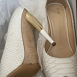 They sent dirty, worn shoes by a completely different designer, not to mention a totally different color.