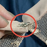 Additional picture showing the latches sewn on incorrectly