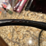 Leather peeling off handle of Chanel purse that was purchased Christmas