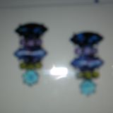 My beautiful new deep blue, green and purple fancy earrings. Just in time for the Holiday festivities.