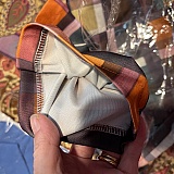 Sheer polyester with a blurred plaid print. Described as mid rise cargo pants. Picture of item on their site is NOT what you will receive.