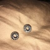 Compare: left side legit charm vs. right side fake charm from RueLaLa