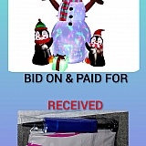 That's just a mylar balloon of a snowman with a little manual air pump, btw. About 3.5 feet tall. No lights, no fan, it wouldn't last a night outside.