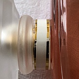 Neck of bottle is a white sticker with join. Should be a solid white and gold plastic ring.