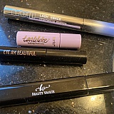 Two tiny mascaras and two regular cheap mascaras. What do i do with all of these?